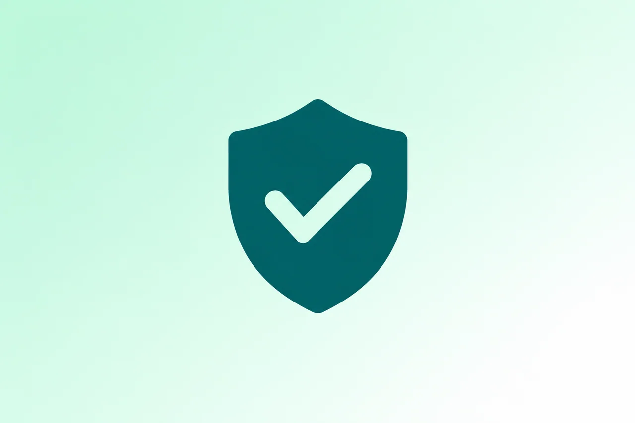 A teal shield with a tick, the Mint cyber security symbol
